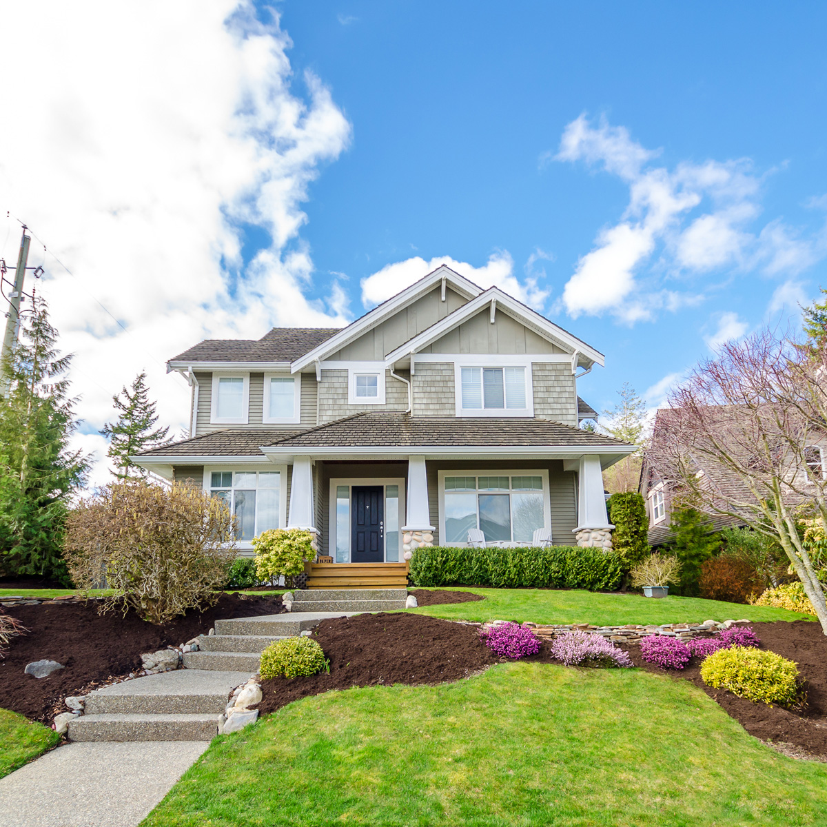 Professional Mulching Services — A Great Choice Lawn Care & Landscaping Freshly mulched garden bed in a Binghamton NY home landscape